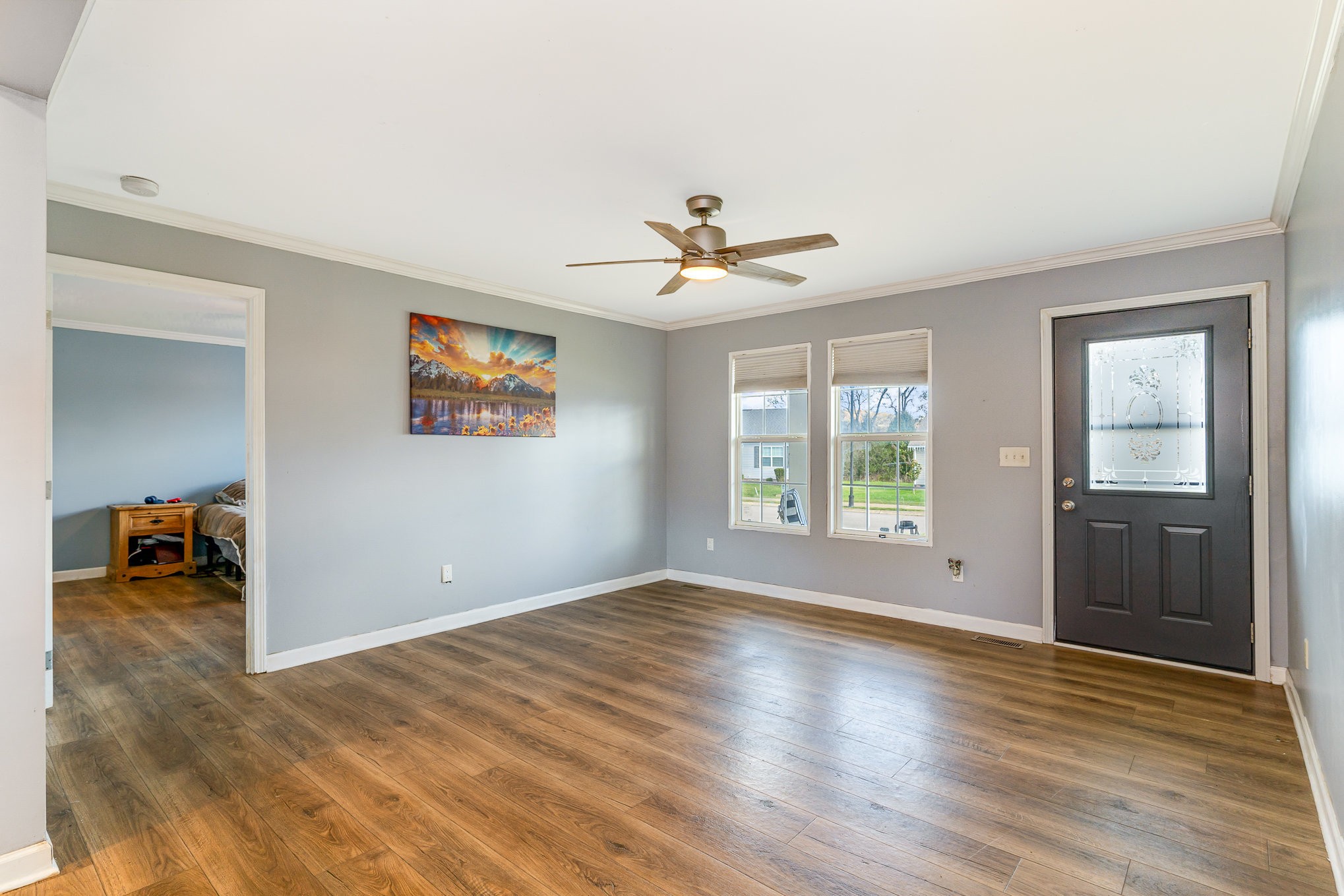 1159 Wrights Mill Road Spring Hill, TN 37174 - Photo 4 of 16 wooden floor in an empty room with a window