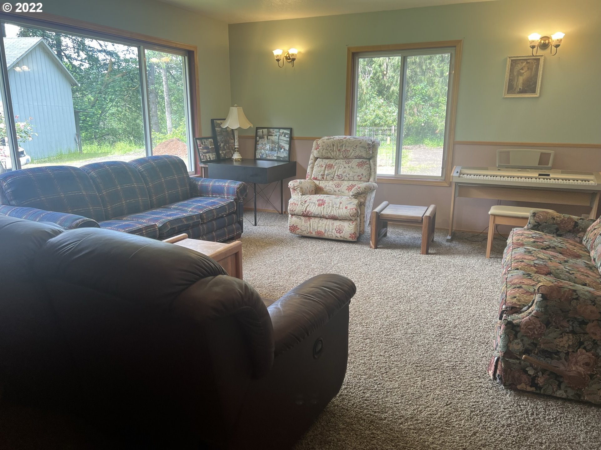 35995 South Wilhoit Road Molalla, OR 97038 - Photo 6 of 17 a living room with furniture and a large window