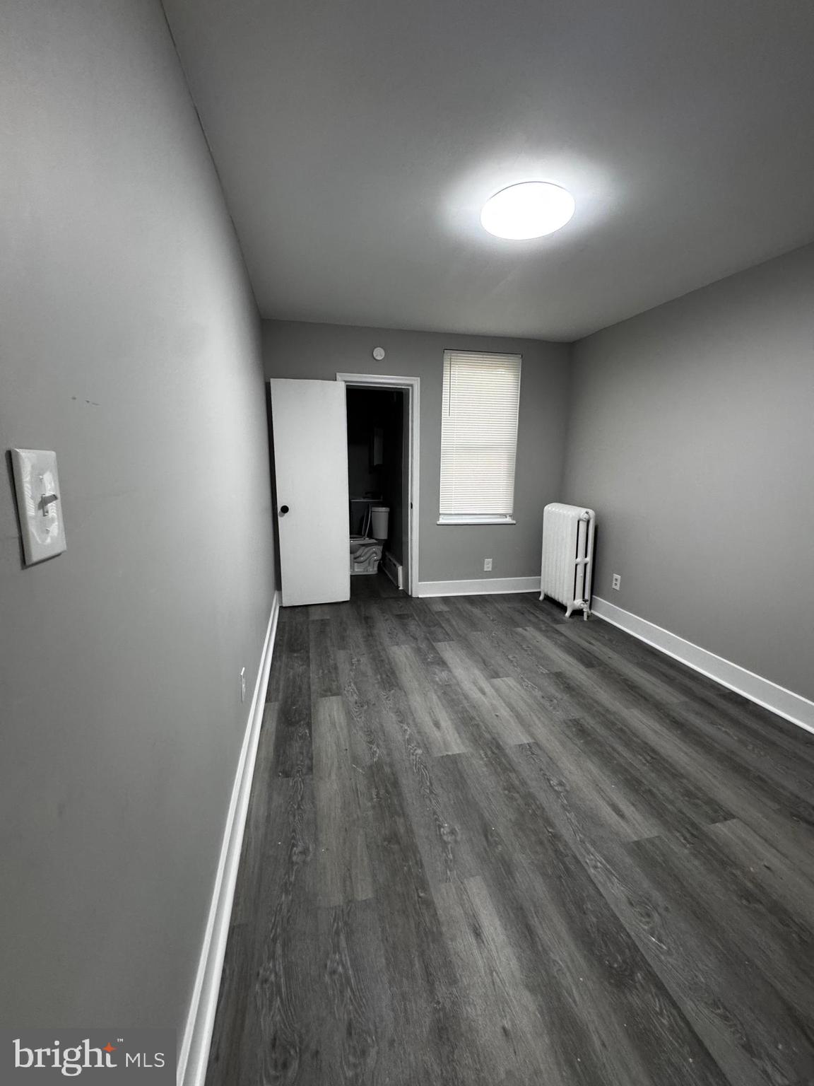 2656 Shields Street Philadelphia, PA 19142 - Photo 3 of 15 a view of empty room with wooden floor