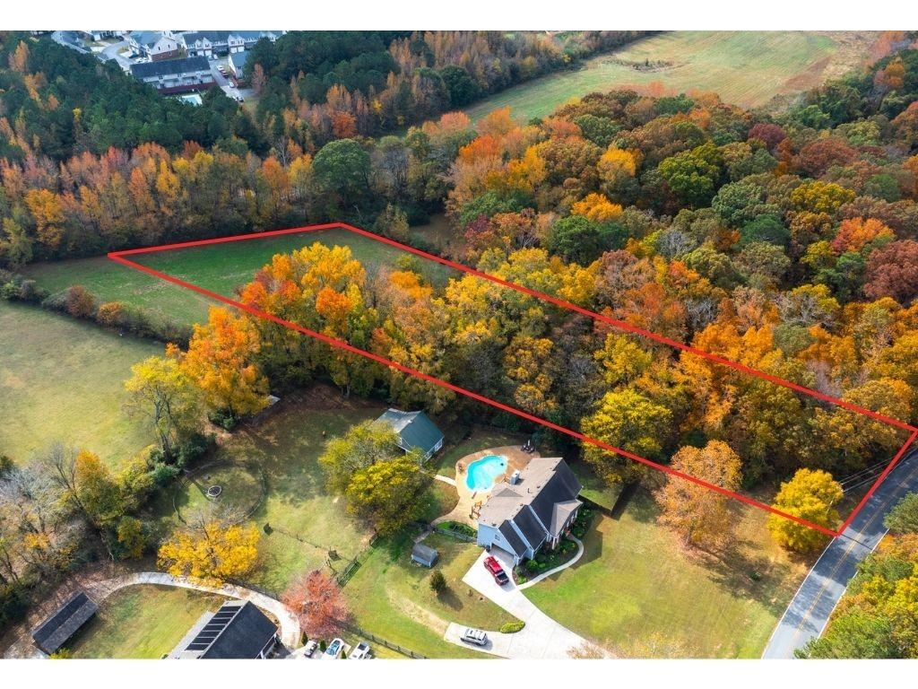 84 Cline Smith Road Northeast Cartersville, GA 30121 - Photo 2 of 14 a view of a lake in a city