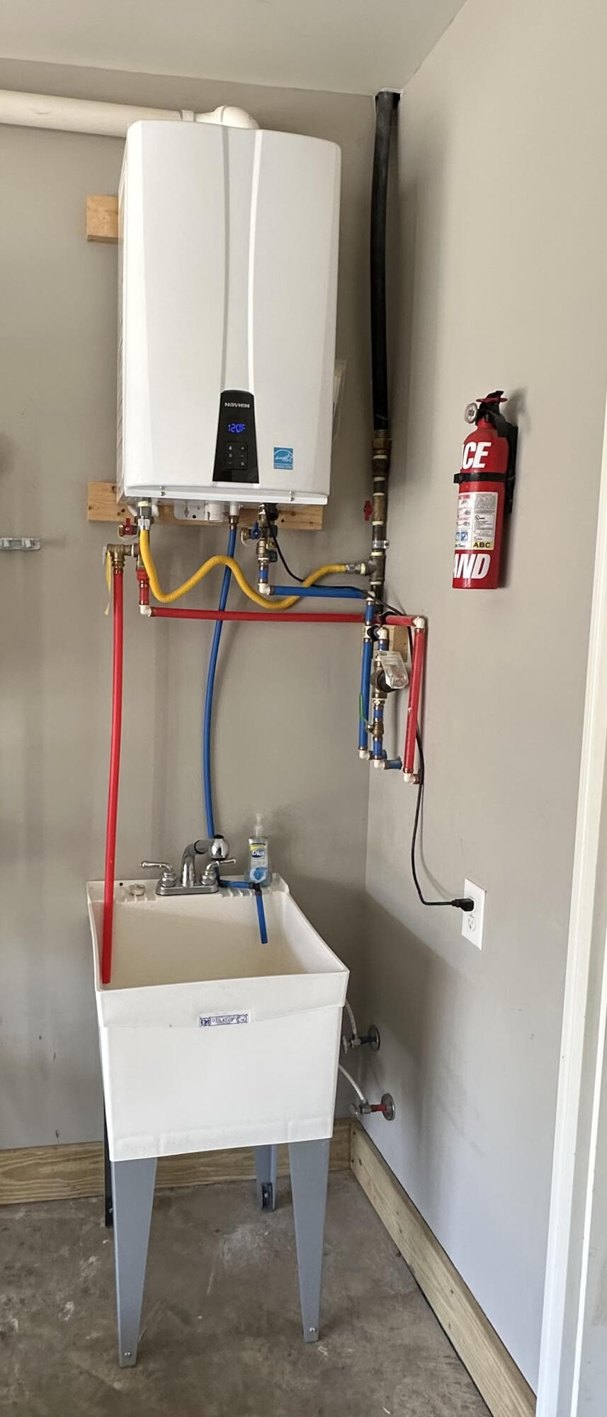 153 Ripple Falls Gray, TN 37615 - Photo 31 of 40 Laundry sink and water heater