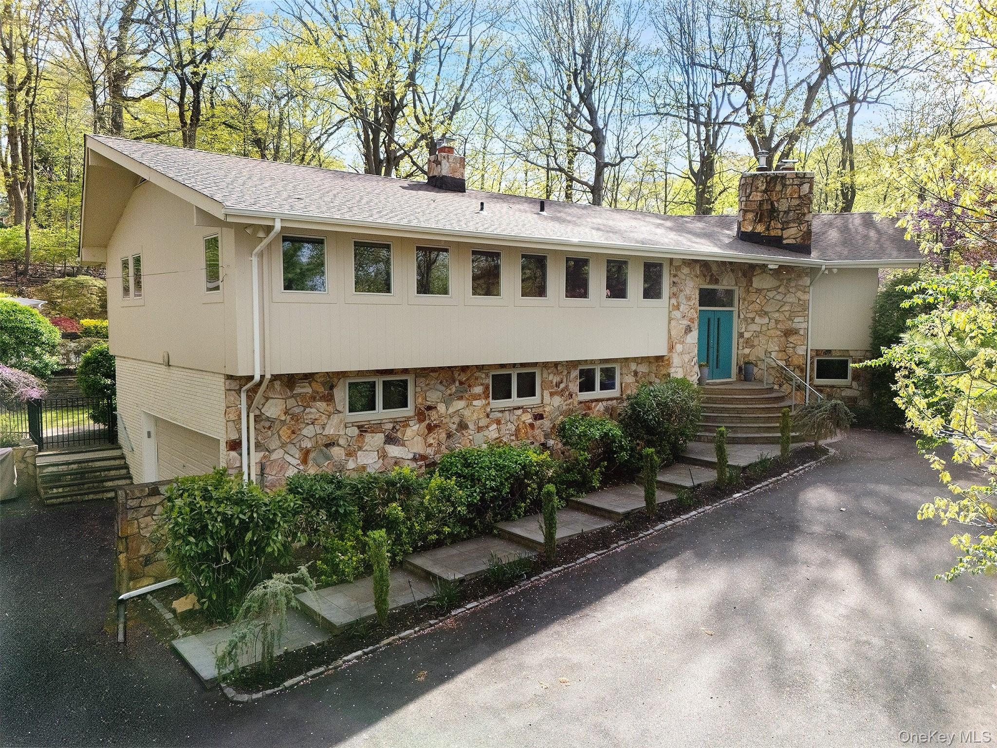 7 SE Road Sands Point, NY 11050 - Photo 3 of 45 a house view with a outdoor space