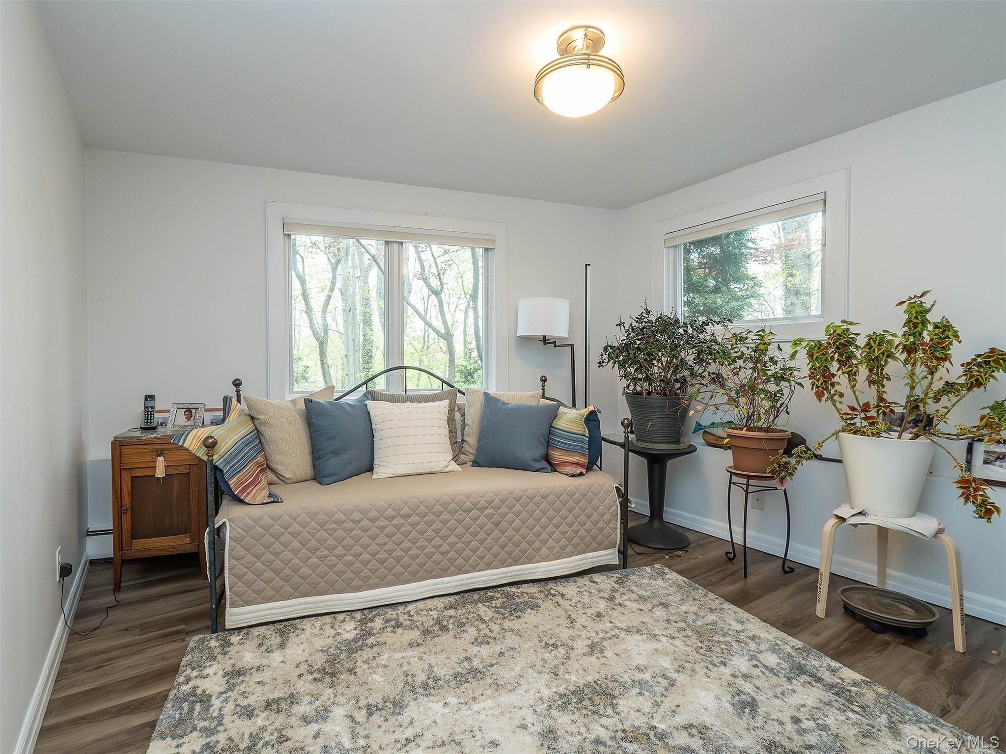 7 SE Road Sands Point, NY 11050 - Photo 34 of 45 a living room with furniture and a potted plant