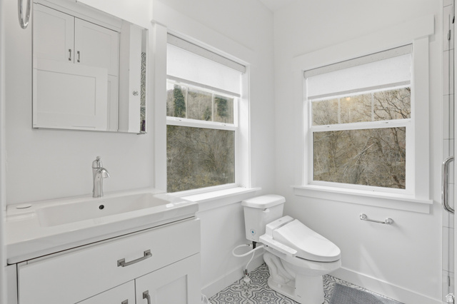 2450 Snake Creek Road Midway, UT 84049 - Photo 15 of 34 Full bathroom with vanity and baseboards