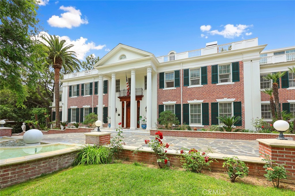 999 Rosalind Road San Marino, CA 91108 - Photo 2 of 70 a front view of building with yard and green space