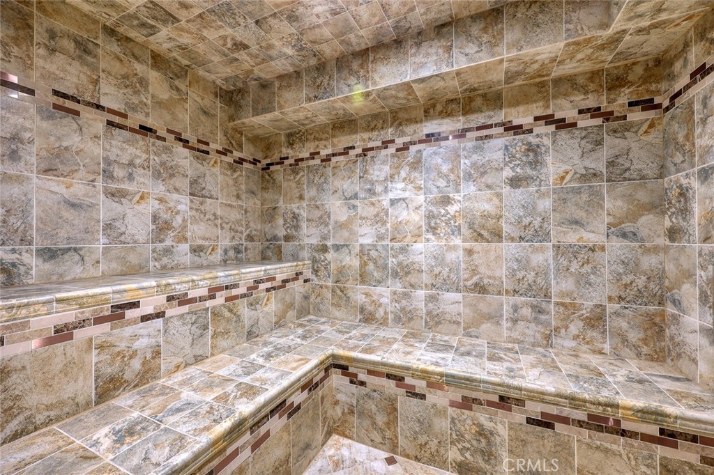 999 Rosalind Road San Marino, CA 91108 - Photo 28 of 70 a bathroom with a bathtub and shower