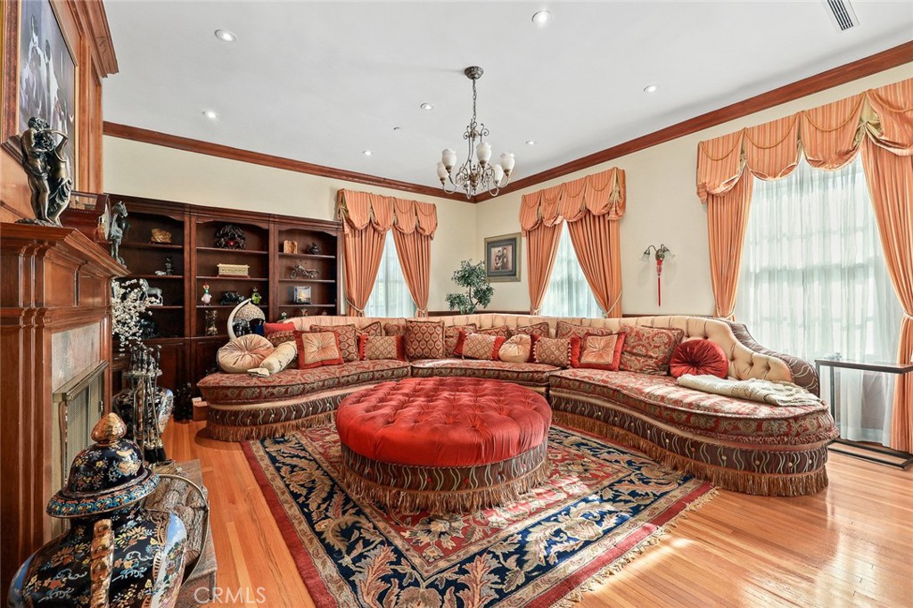 999 Rosalind Road San Marino, CA 91108 - Photo 32 of 70 a living room with furniture fireplace and a large window