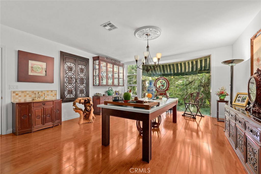 999 Rosalind Road San Marino, CA 91108 - Photo 39 of 70 a view of a livingroom with furniture window and wooden floor