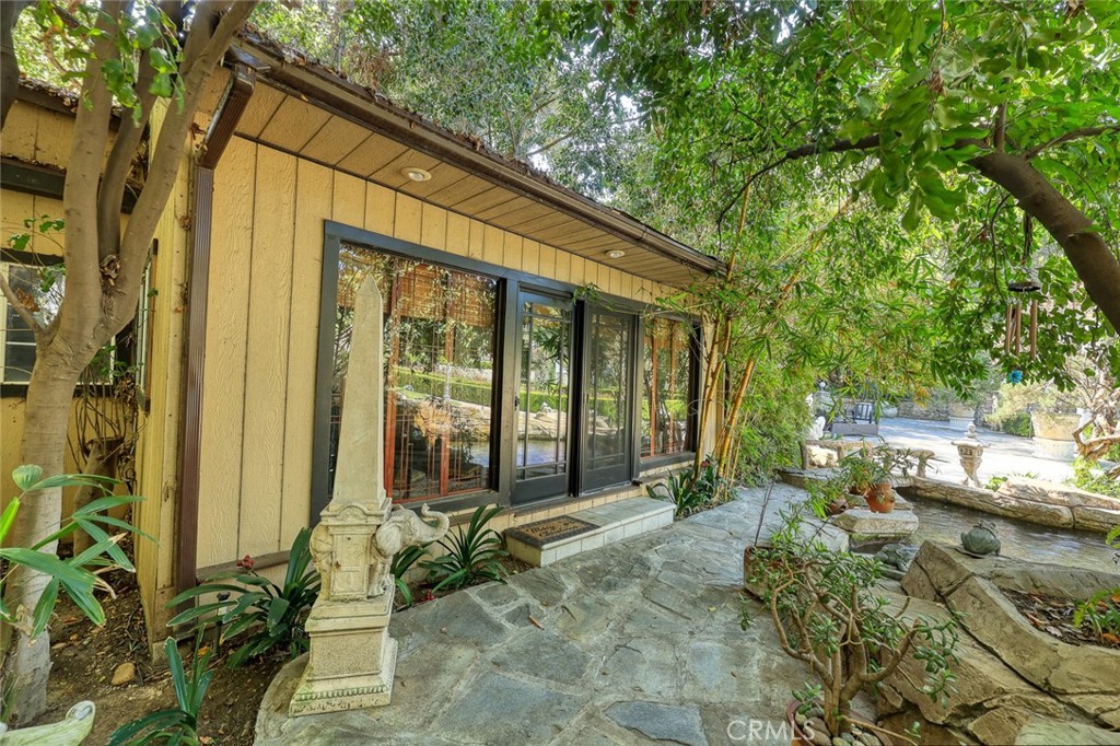 999 Rosalind Road San Marino, CA 91108 - Photo 40 of 70 a backyard of a house with outdoor seating