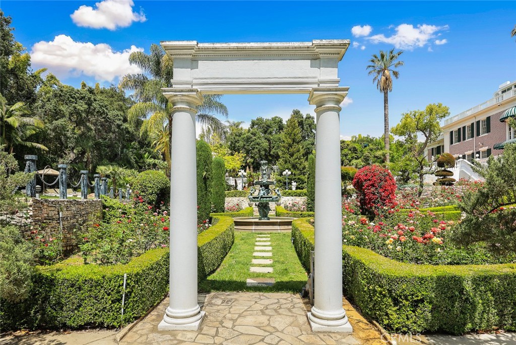 999 Rosalind Road San Marino, CA 91108 - Photo 65 of 70 a front view of a house with a garden