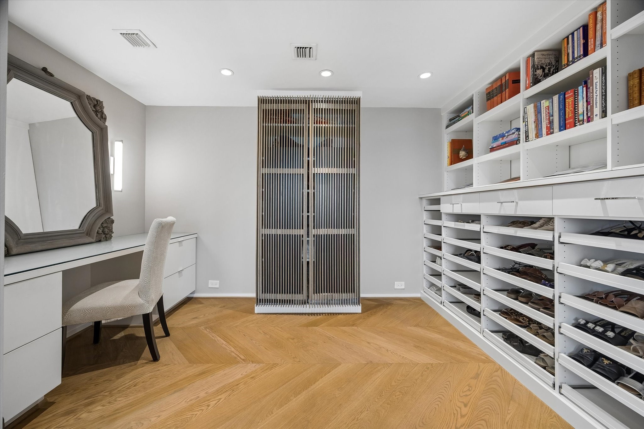 2200 Willowick Road, Unit 5C Houston, TX 77027 - Photo 15 of 27 Home office and closet space with Spaceman designed built in storage.