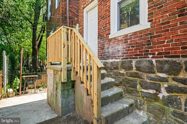 a view of a bathroom with a glass door