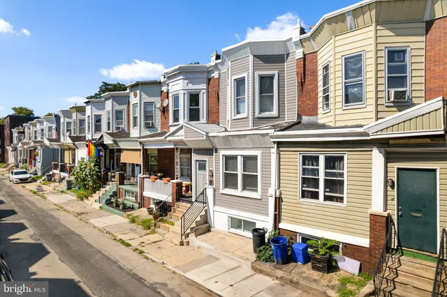a view of a building with sitting area