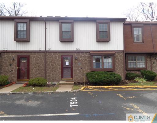 7504 Hana Road Edison, NJ 08817 - Photo 10 of 10 a front view of a house with a yard