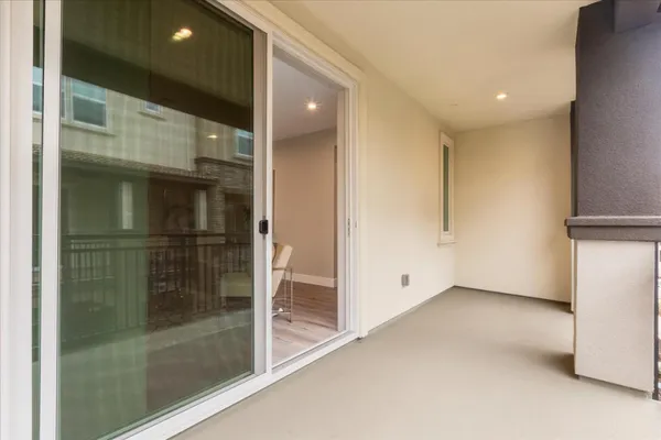a view of a hallway with entryway