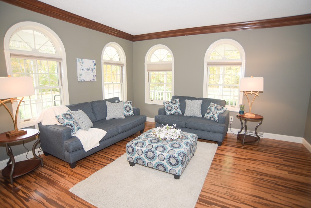 1436 Morgan Road West Springfield, MA 01089 - Photo 16 of 30 a living room with couches and a large mirror with wooden floor