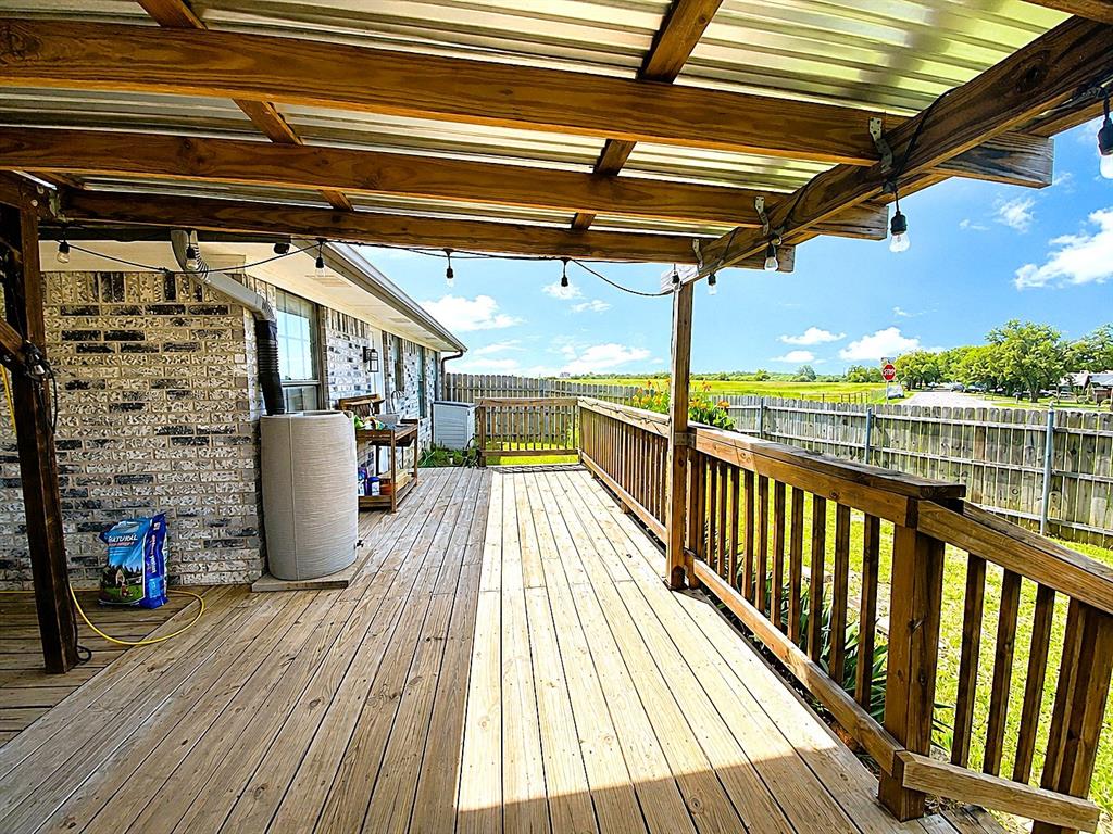 404 Old Mansfield Road Keene, TX 76059 - Photo 22 of 33 Deck that wraps around to side of house
