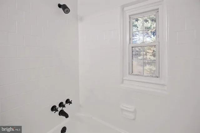 a bathroom with a bathtub