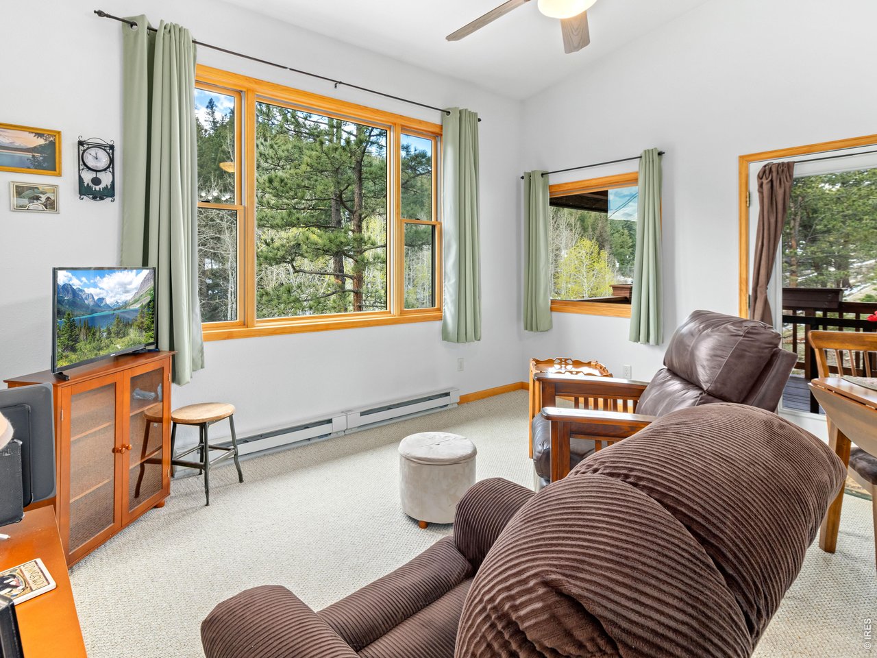 1002 Streamside Drive Drake, CO 80515 - Photo 25 of 37 a bedroom with two beds and a large window