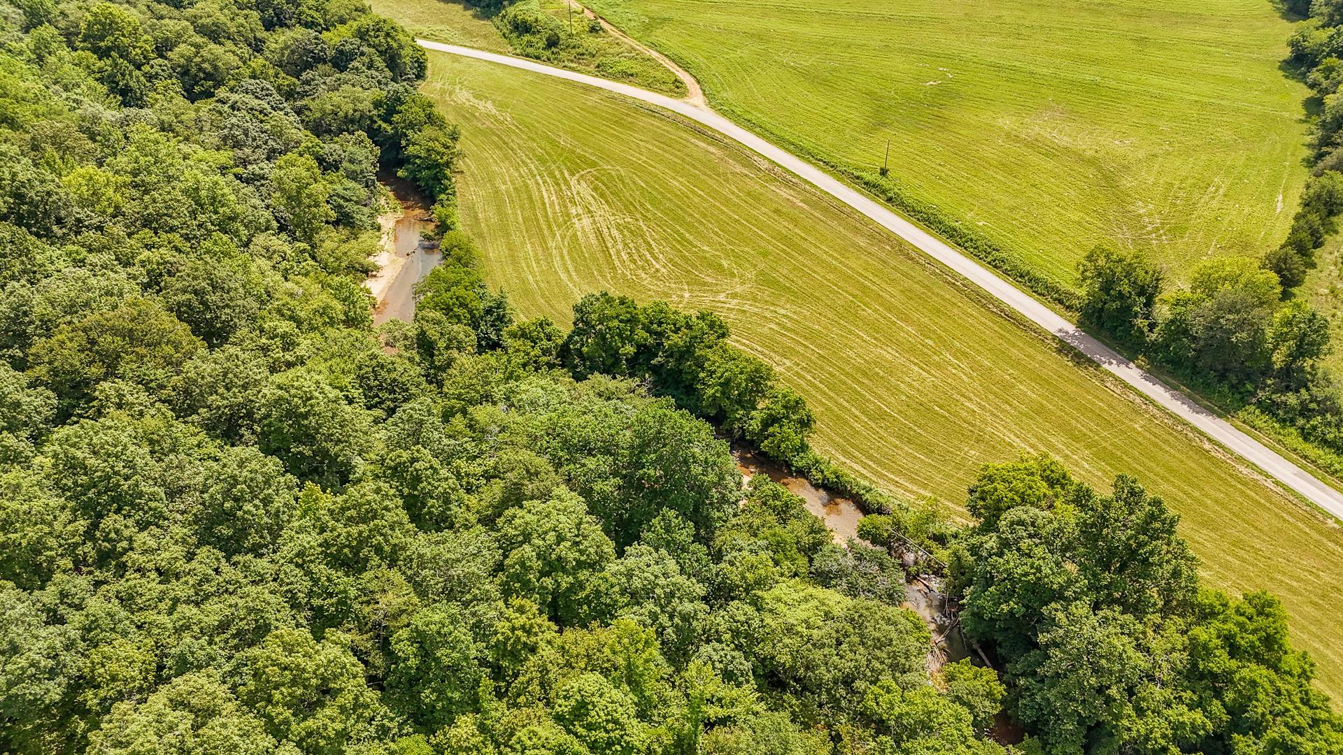 2245 Big Ivy Road Savannah, TN 38372 - Photo 9 of 37 a view of a large body of water with a large building