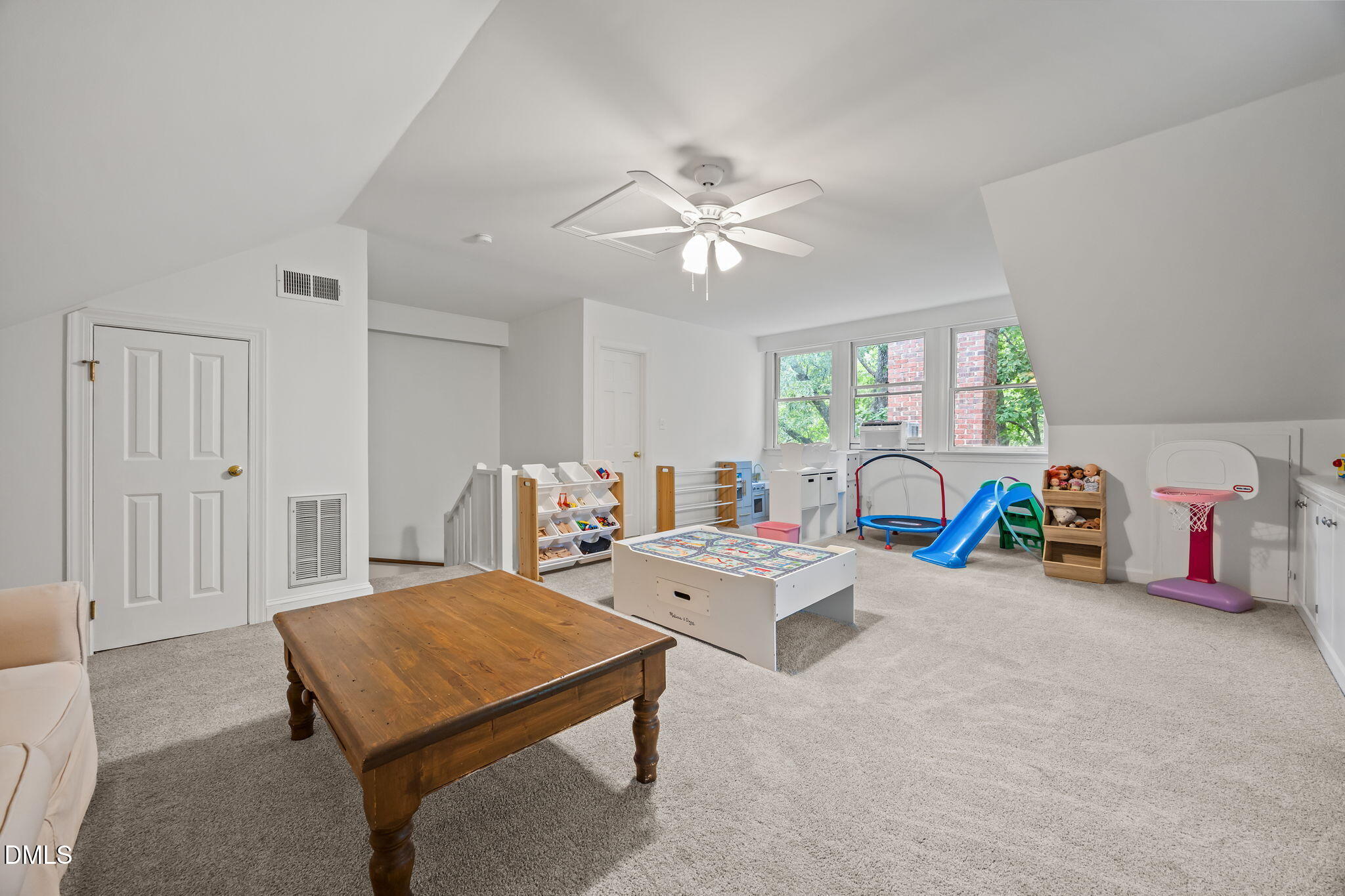 562 Weathergreen Drive Raleigh, NC 27615 - Photo 29 of 47 a living room with furniture a ceiling fan and a window