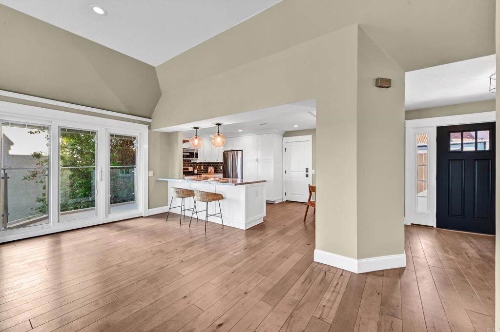 1760 Gascony Road Encinitas, CA 92024 - Photo 11 of 49 a living room with furniture and a wooden floor