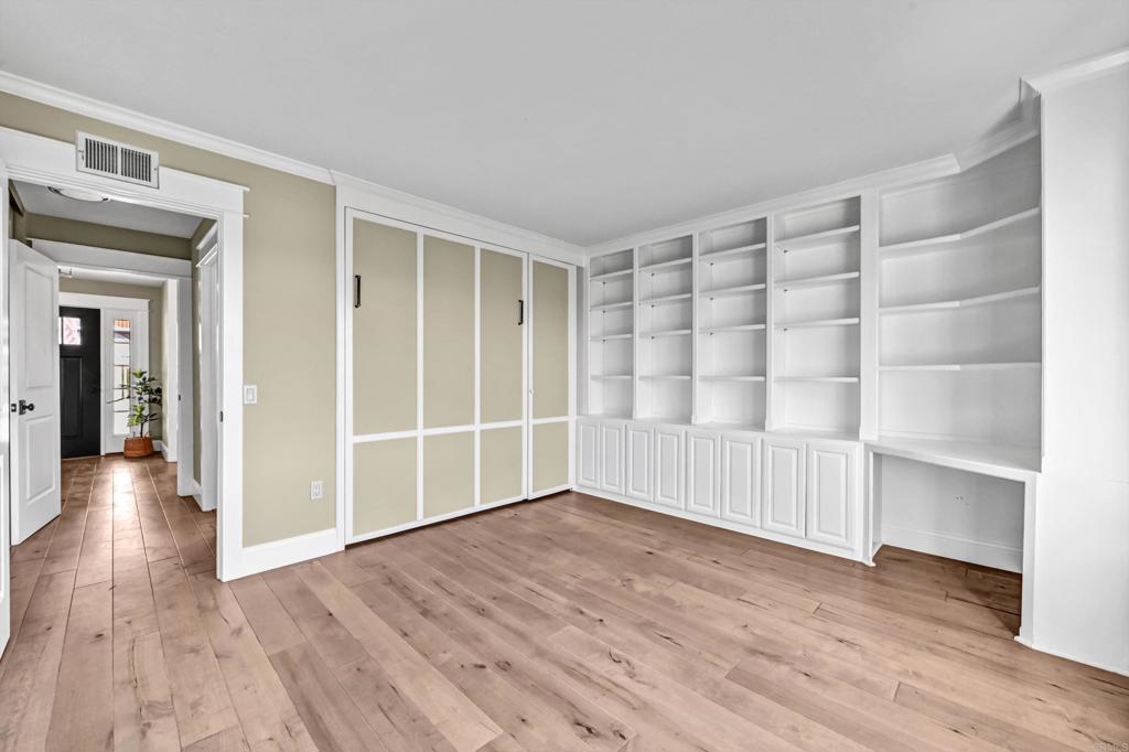 1760 Gascony Road Encinitas, CA 92024 - Photo 27 of 49 wooden floor in an empty room with a window