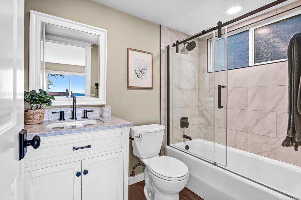 1760 Gascony Road Encinitas, CA 92024 - Photo 32 of 49 a bathroom with a sink toilet and shower