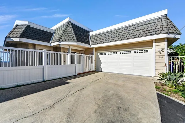 an aerial view of a house with a garden