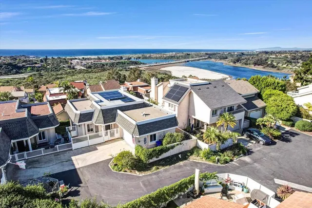 an aerial view of a house with a garden