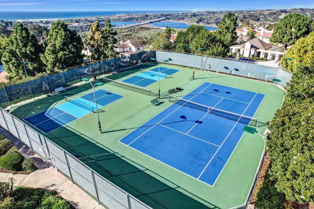 1760 Gascony Road Encinitas, CA 92024 - Photo 46 of 49 an aerial view of a tennis ground with a small pool