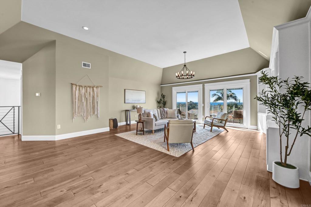 1760 Gascony Road Encinitas, CA 92024 - Photo 9 of 49 a living room with furniture and a large window