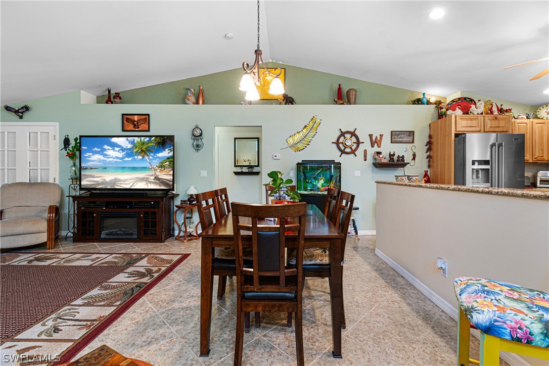 9701 Baycrest Terrace Lehigh Acres, FL 33936 - Photo 16 of 50 a view of a dining room with furniture