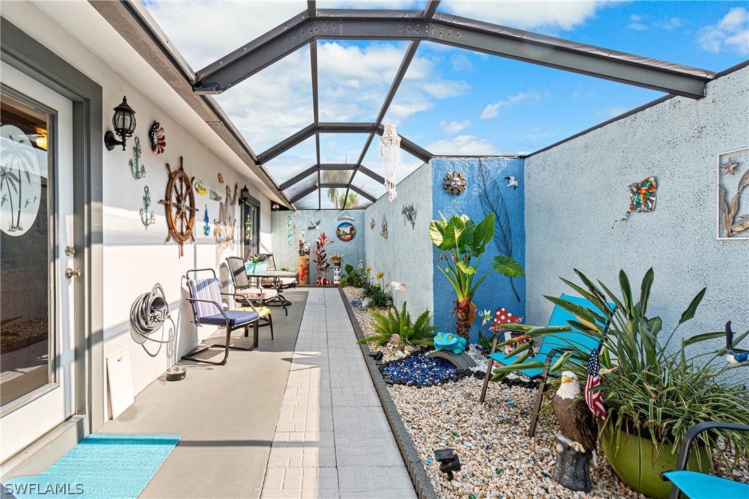 9701 Baycrest Terrace Lehigh Acres, FL 33936 - Photo 33 of 50 a view of an entryway with a workspace