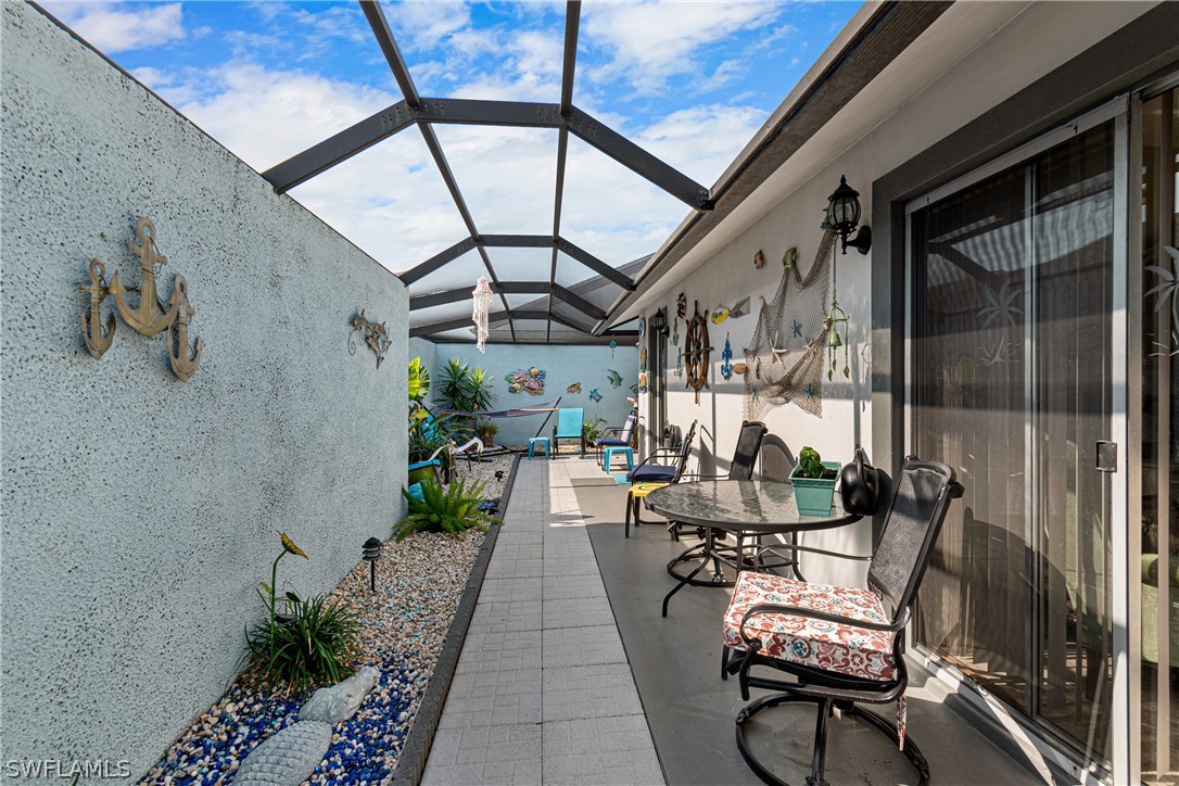 9701 Baycrest Terrace Lehigh Acres, FL 33936 - Photo 35 of 50 a view of swimming pool with outdoor seating