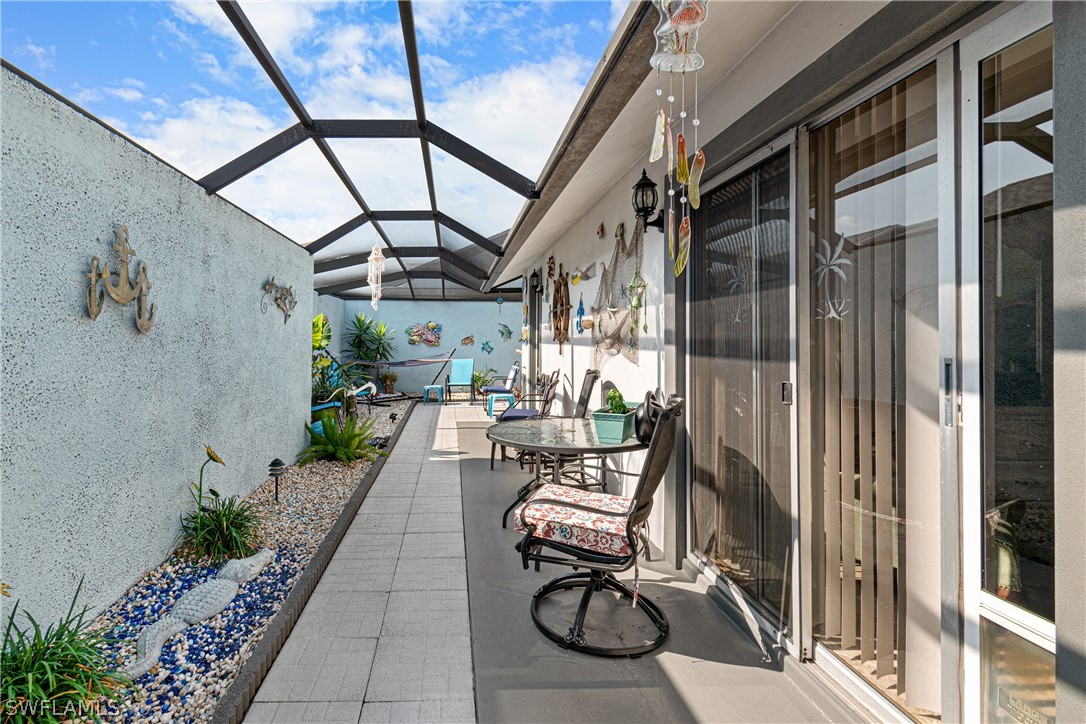 9701 Baycrest Terrace Lehigh Acres, FL 33936 - Photo 36 of 50 a view of porch with seating area