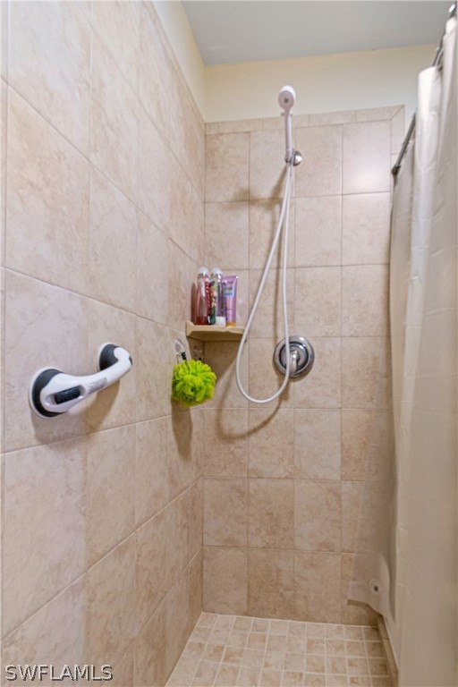 9701 Baycrest Terrace Lehigh Acres, FL 33936 - Photo 48 of 50 a bathroom with a shower