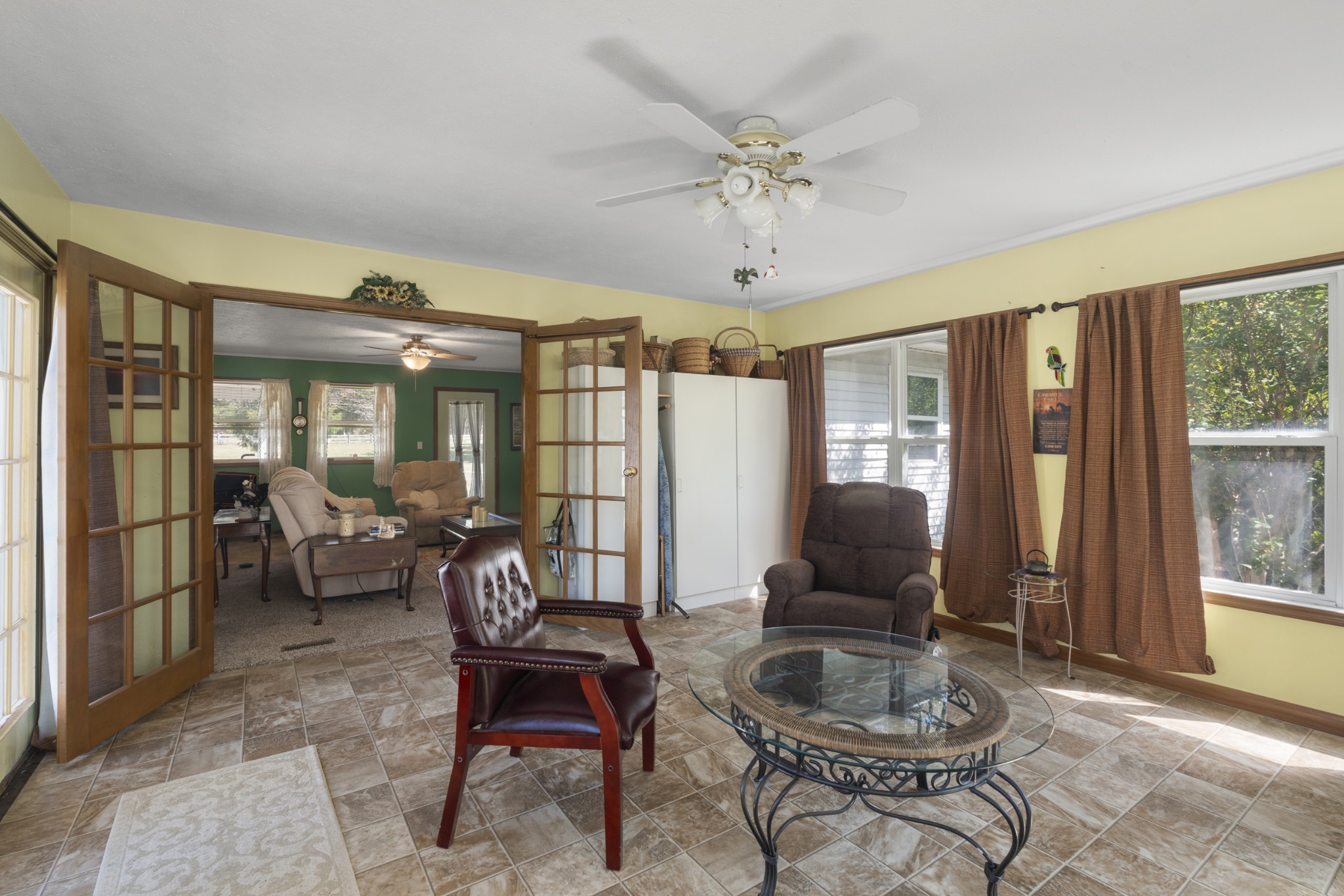 3859 Erin Road McEwen, TN 37101 - Photo 28 of 52 a living room with furniture and a floor to ceiling window
