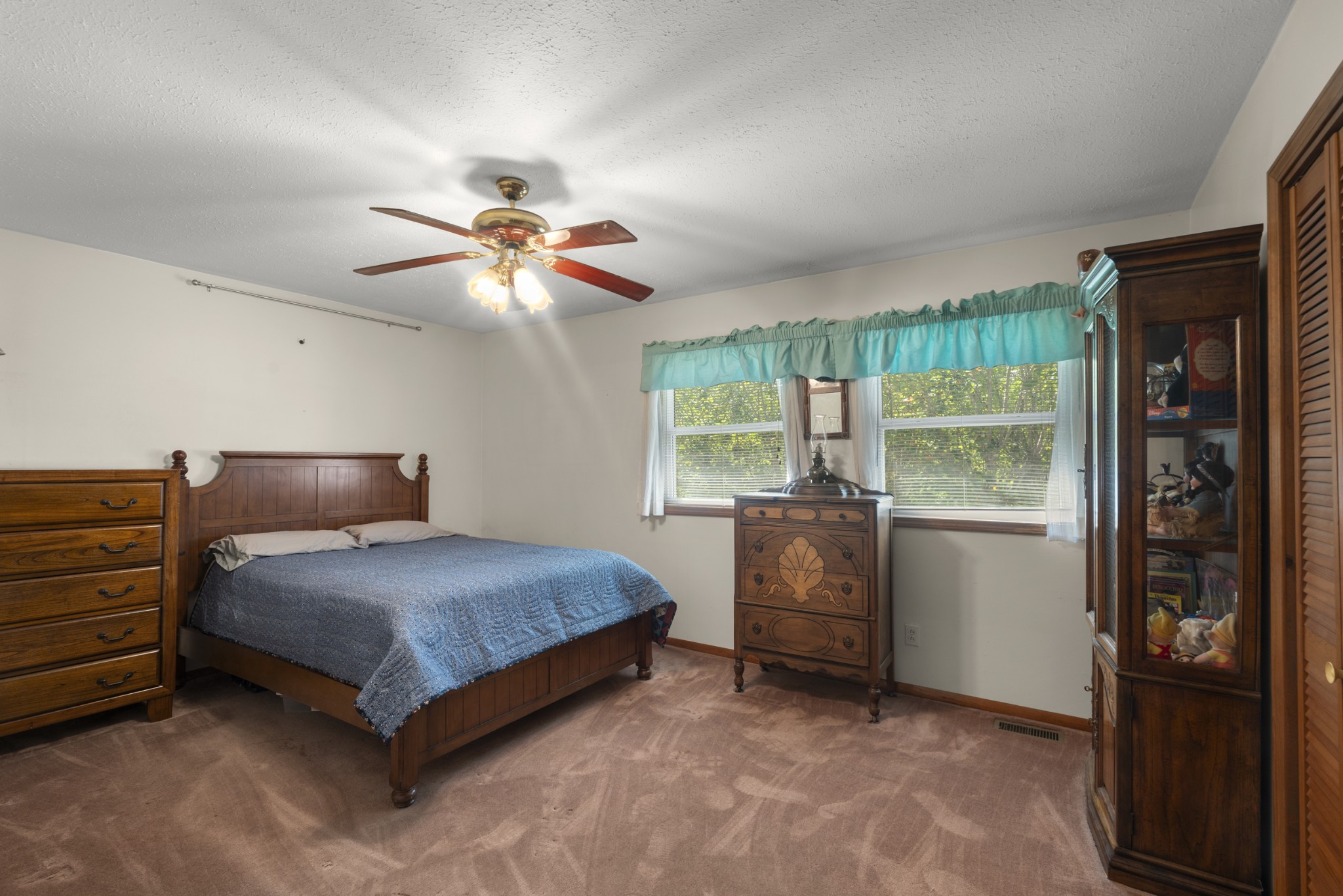 3859 Erin Road McEwen, TN 37101 - Photo 41 of 52 a bedroom with a bed and a ceiling fan