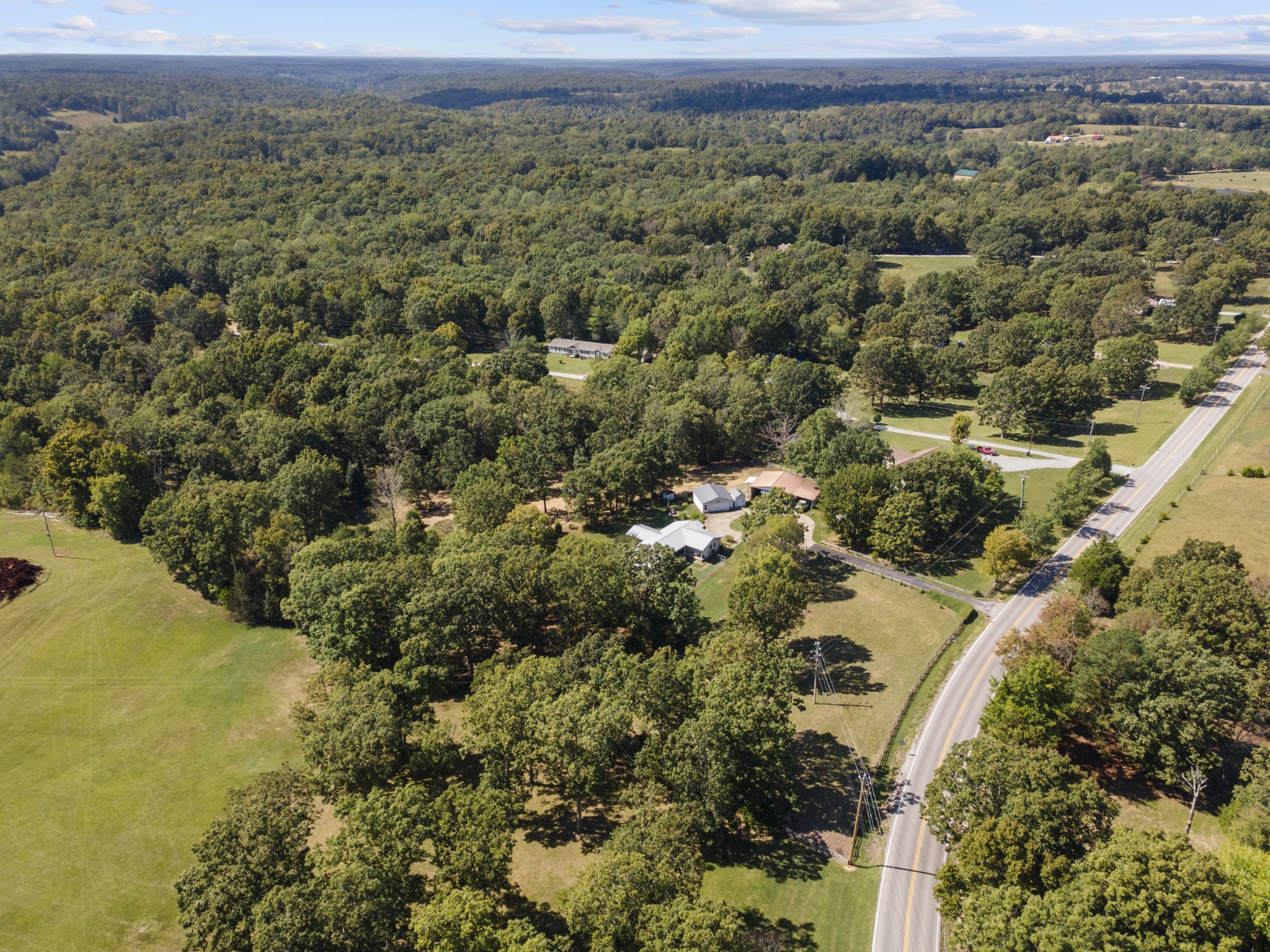 3859 Erin Road McEwen, TN 37101 - Photo 46 of 52 an aerial view of a houses with a yard and lake view