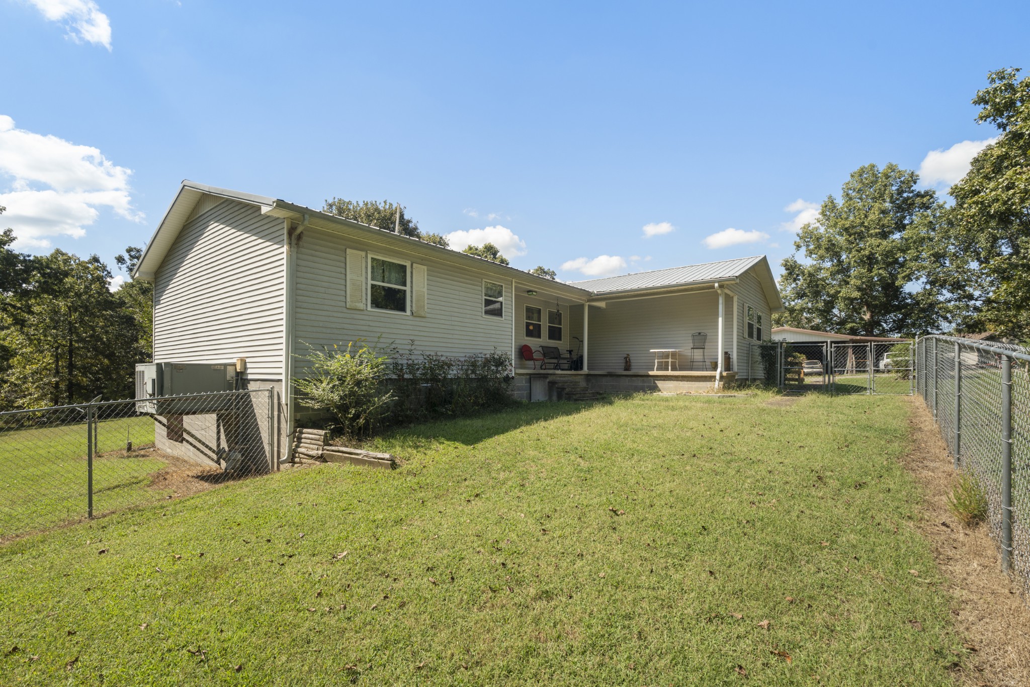 3859 Erin Road McEwen, TN 37101 - Photo 7 of 52 a view of backyard of a house