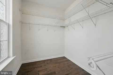 a view of a room with racks on the wall