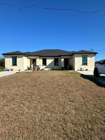 a large house with a yard