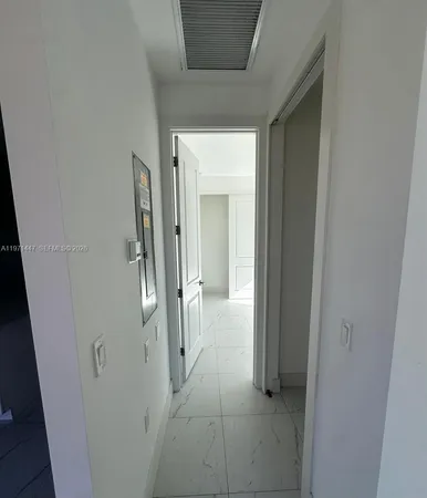 an empty room with an entryway