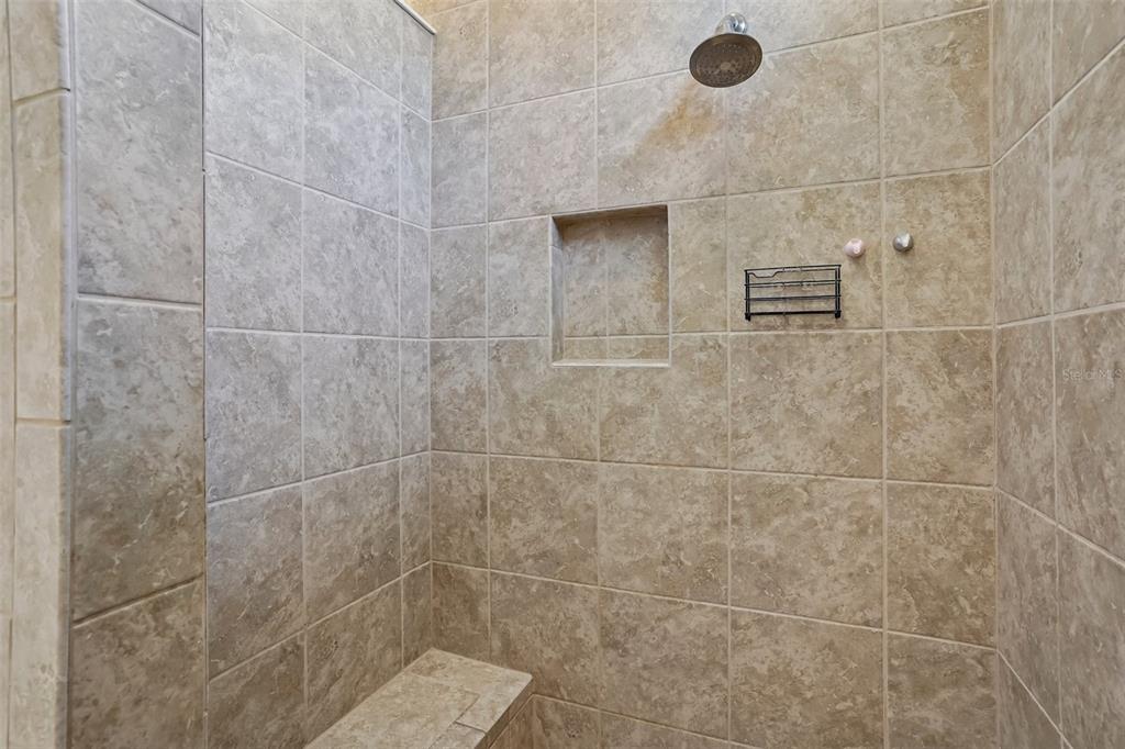 10339 Addison Shore Way Oxford, FL 34484 - Photo 42 of 54 a bathroom with a shower
