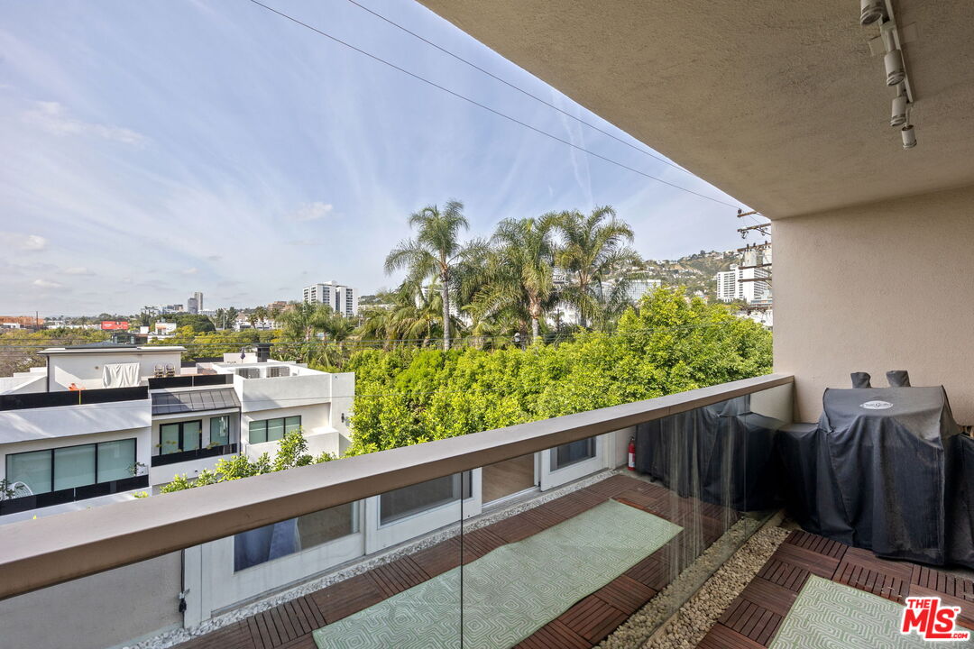 1025 North Kings Road, Unit 313 West Hollywood, CA 90069 - Photo 9 of 18 a view of balcony with furniture