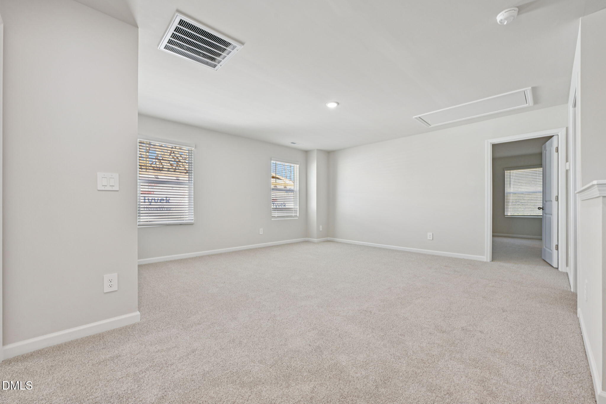 2145 Topsail Road Durham, NC 27703 - Photo 24 of 49 an empty room with windows and closet