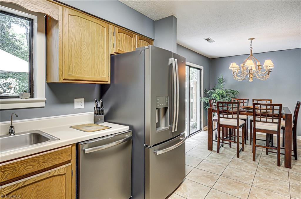 236 Northpoint Avenue, Unit F High Point, NC 27262 - Photo 25 of 25 This open floor plan easily flows from the kitchen to the dining room and is perfect for dinner parties! Note the stainless appliances and tile floor!