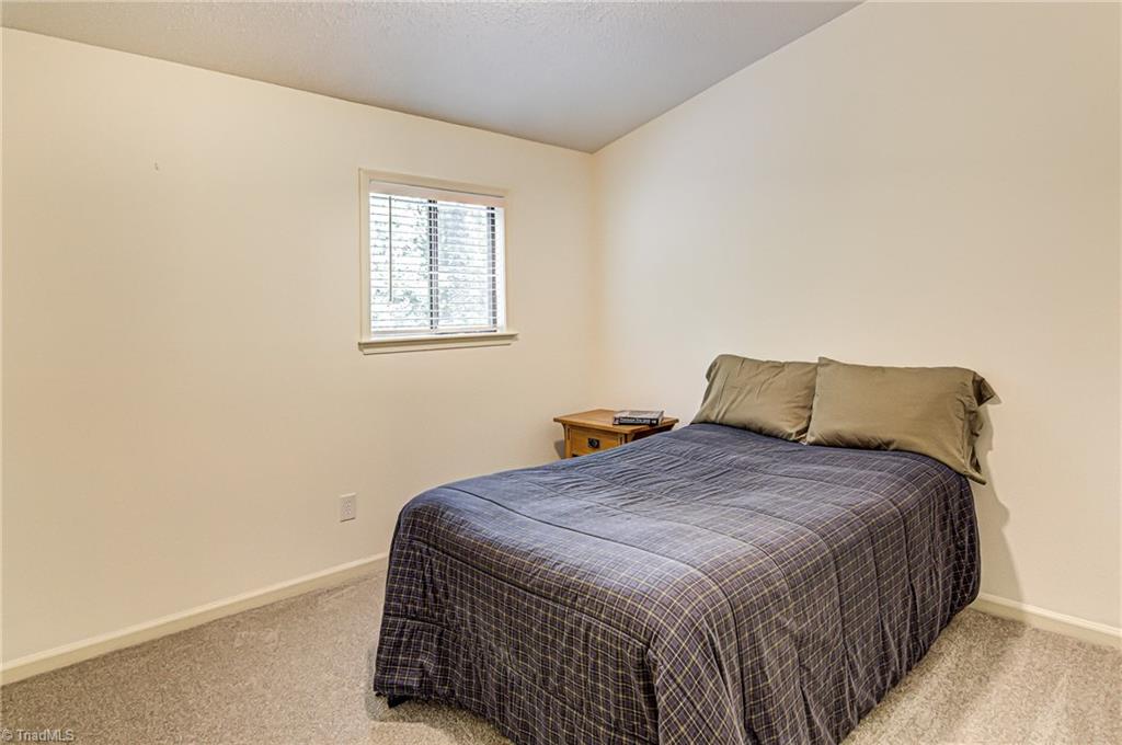 236 Northpoint Avenue, Unit F High Point, NC 27262 - Photo 18 of 25 Alternate view of the second bedroom. Note the vaulted ceilings again!