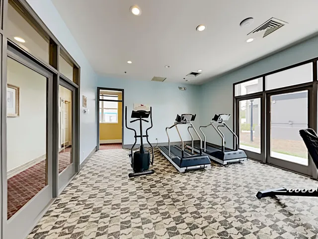 a spacious bathroom with a double vanity sink and a mirror